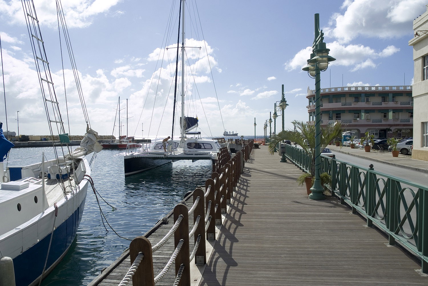 View of historic buildings and a bustling waterfront in Bridgetown, Barbados.