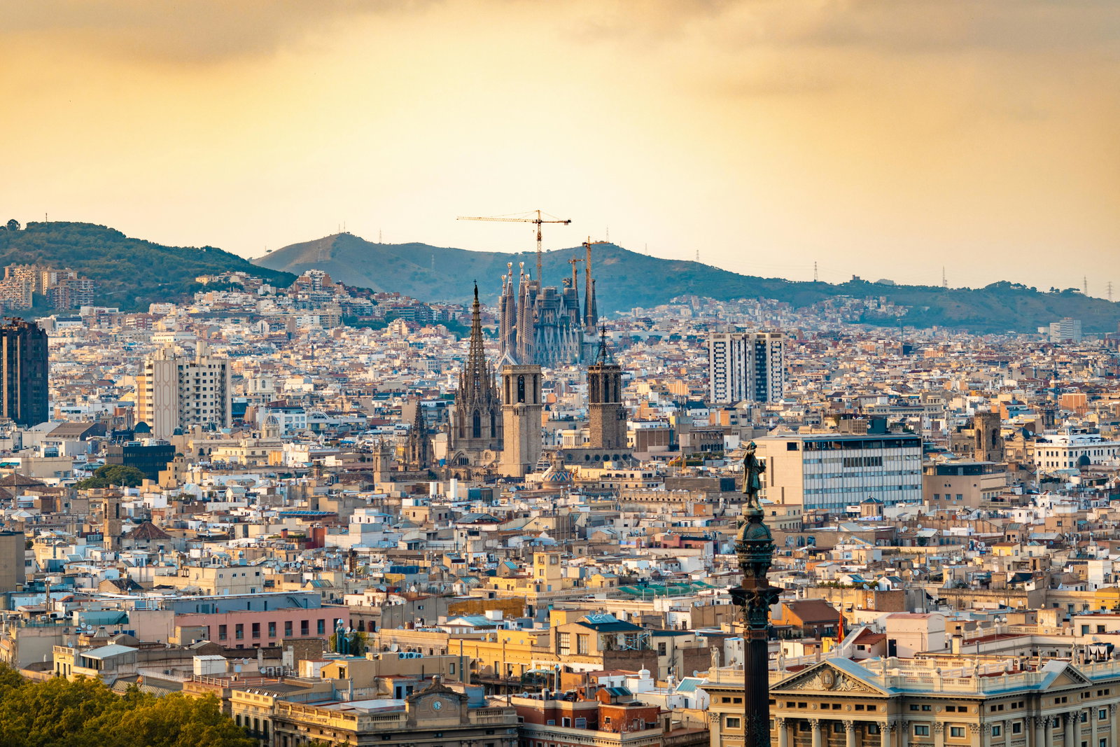 View of Barcelona's Gothic Quarter with historic buildings and bustling streets.