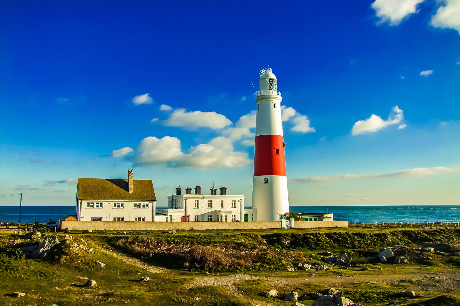 Cruise ship docked at the rugged coastline of the Isle of Portland, England
