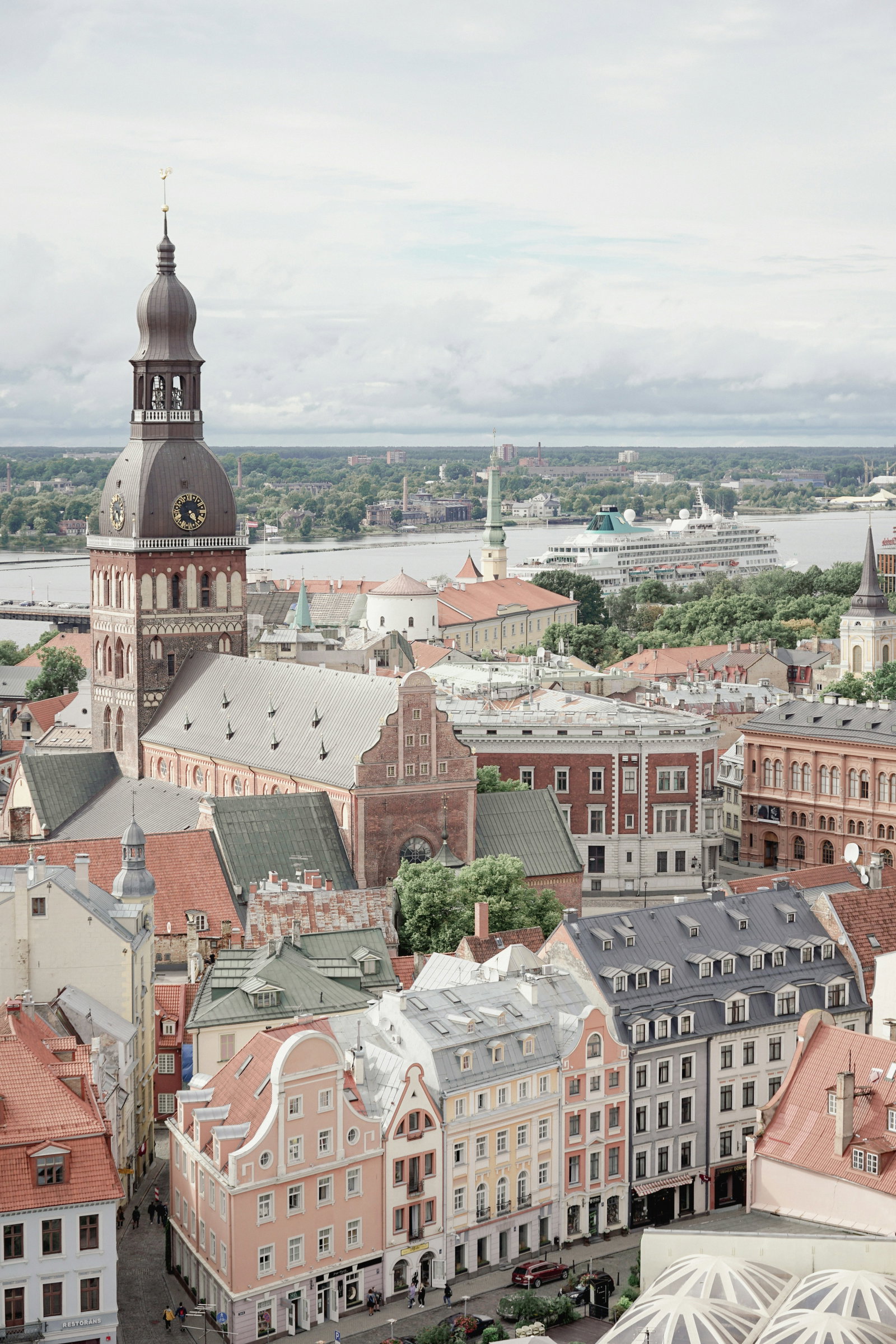 Ornate Art Nouveau building facades lining a historic street in Riga, Latvia.