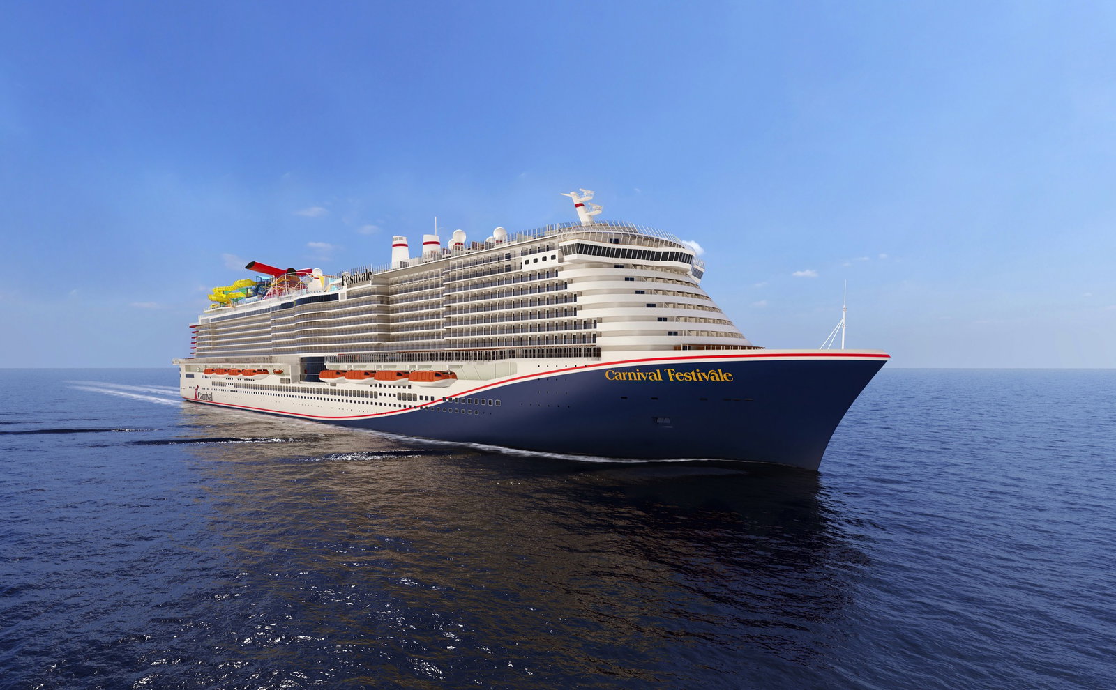 Aerial view of a large cruise ship with a vibrant waterpark on its upper deck