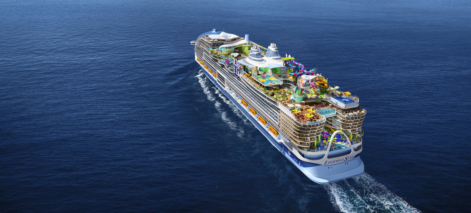 A large cruise ship sailing on blue waters with a vibrant, multi-deck design and numerous pools.